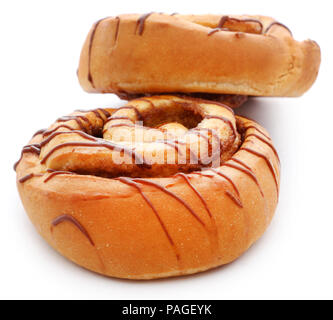 Close up of a cinnamon bun isolated against white background Stock Photo