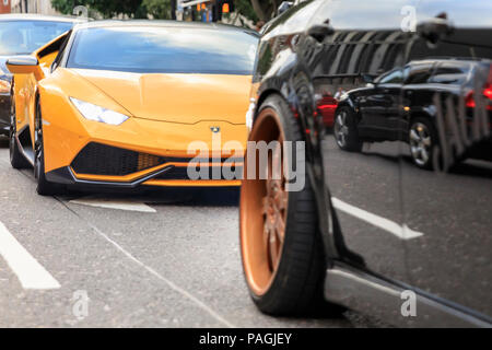 Sloane Street, London, UK, 20th July 2018. Supercars, high-performance and classic cars, as well as some characterful adaptions, line up and drive along Sloane Street for Supercar Sunday, which sees around 400 cars attending. The meetup is organised by Surrey Car Meet and on social media.