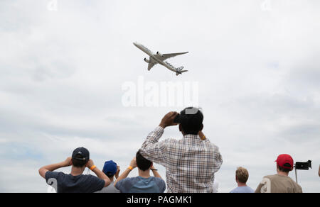 Farnborough, London. 22nd July, 2018. An Airbus A350-1000 XWB passenger aircraft performs in a flying display at the Farnborough International Airshow, south west of London, Britain on July 22, 2018. Credit: Han Yan/Xinhua/Alamy Live News Stock Photo