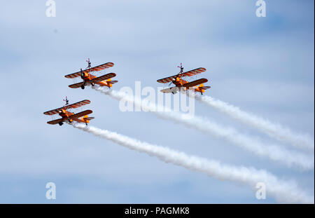 Farnborough, London. 22nd July, 2018. The Breitling Wingwalkers team perform at the Farnborough International Airshow, south west of London, Britain on July 22, 2018. Credit: Han Yan/Xinhua/Alamy Live News Stock Photo