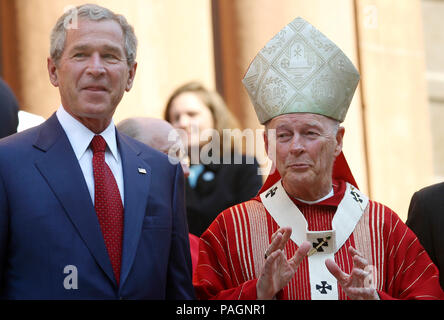 October 1, 2005 - Washington, District of Columbia, United States of America - Washington, DC - October 2, 2005 ''“ United States President George W. Bush attends 52nd Annual Red Mass at St. Matthews Cathedral. Red Mass is a tradition that is held the Sunday prior to the Supreme Court's opening session. The service gives special prayers for the court and the judges as they start hearing this session's cases. This mass is special in that the new Chief Justice, John G. Roberts, Jr. was in attendance along with his wife Jane. First lady Laura Bush was in attendance as well as United St Stock Photo