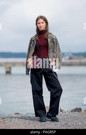 A chic showgoer posing on the street during Helsinki Fashion Week - July 21, 2018 - Photo: Runway Manhattan | Verwendung weltweit Stock Photo