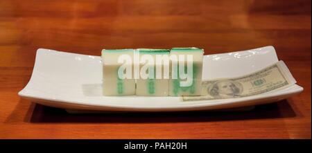 Dim sum is a style of Chinese cuisine, particularly Cantonese, prepared as small bite-size portions of food served in small steamer baskets or on smal Stock Photo