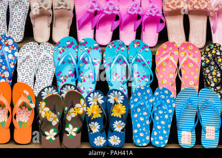 Sale of slippers in the local market, Luang Prabang, Laos. Close-up Stock Photo