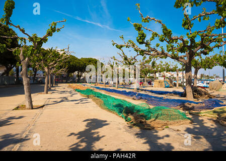 Colorful fishing nets in the port Cambrils, Catalonia, Spain. Copy space for text Stock Photo