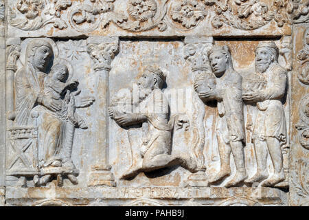 Birth of Jesus, Adoration of the Magi, medieval relief on the facade of Basilica of San Zeno in Verona, Italy Stock Photo