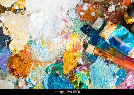 Abstract art background, oil painting on canvas, multicolored bright texture, fragment of artwork, spots of oil paint, brushstrokes of paint, modern art, contemporary art Stock Photo