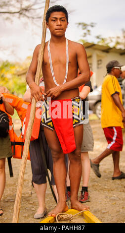 EMBERA VILLAGE, PANAMA, JANUARY 9, 2012: Unidentified Panamanaian Indian man in Panama, Jan 9, 2012. Indian reservation is the way to conserve native  Stock Photo