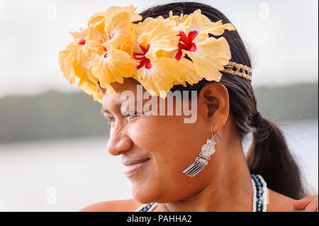 EMBERA VILLAGE, PANAMA, JANUARY 9, 2012: Portrait of an unidentified native Indian woman with flowers in Panama, Jan 9, 2012. Embera village is the In Stock Photo