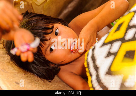 EMBERA VILLAGE, PANAMA, JANUARY 9, 2012: Unidentified native Indian children of Indian reservation in Panama, Jan 9, 2012. Indian reservation is the w Stock Photo