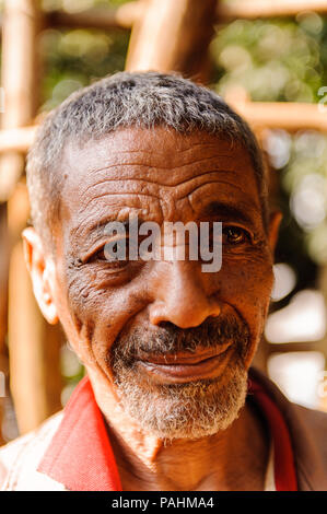 OMO VALLEY, ETHIOPIA - SEP 19, 2011: Portrait of an unidentified Ethiopian serious man in Ethiopia, Sep.19, 2011. People in Ethiopia suffer of poverty Stock Photo