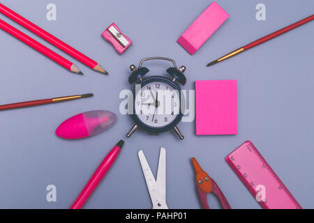 Back to school concept background with pink school accessories. Stock Photo