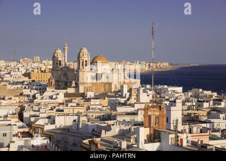 Aerial panoramic view of the old city rooftops and Cathedral de Santa Cruz in the afternoon from tower Tavira in Cadiz, Andalusia Stock Photo