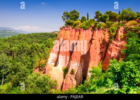 Roussillon, red rocks of Colorado colorful ochre canyon in Provence, landscape of France. Stock Photo