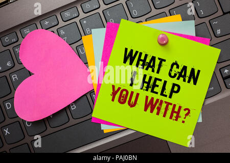 Text sign showing What Can I Help You With question. Conceptual photo Offering assistance Experts advice ideas Bright colorful written papers pinch by Stock Photo