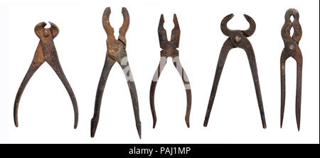 group of antique pliers on white Stock Photo