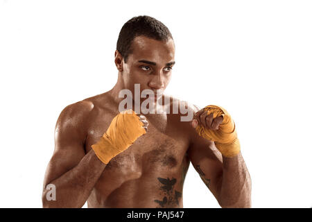 Sporty man during boxing exercise. Photo of boxer on white background Stock Photo