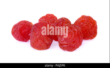 Dried preserved chinese plum or dried fruits on white background Stock Photo