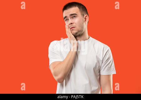 Young man is having toothache. Stock Photo