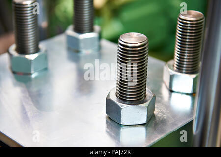 Bolt nuts on industrial equipment Stock Photo