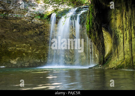 The Gour Bleu Waterfall Illuminated by Summer Sunshine, Cascades du Herisson, Jura, France, EU. Stock Photo