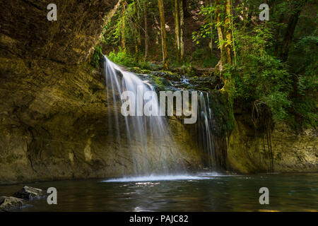 The Gour Bleu Waterfall Illuminated by Summer Sunshine, Cascades du Herisson, Jura, France, EU. Stock Photo