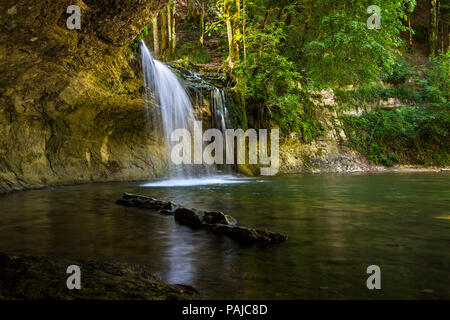 The Gour Bleu Waterfall Illuminated by Summer Sunshine, Cascades du Herisson, Jura, France, EU. Stock Photo