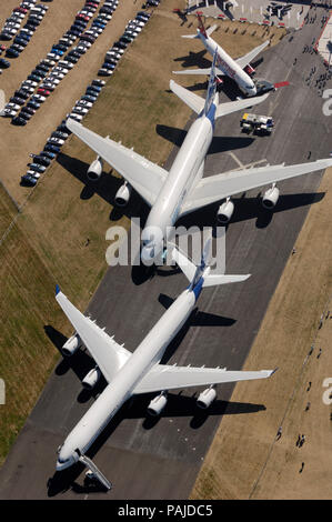Airbus A380-800, Kingfisher Airlines A320-200 and A340-600 parked in the static-display at the 2006 Farnborough International Airshow