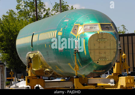 the fuselage of a Boeing 737-700 (LN2350) on a trolley outside the production factory Stock Photo