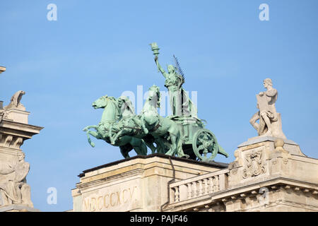 Statues on roof of Museum of Ethnography in Budapest, Hungary. The building located at Kossuth Square, across from the Hungarian Parliament Stock Photo