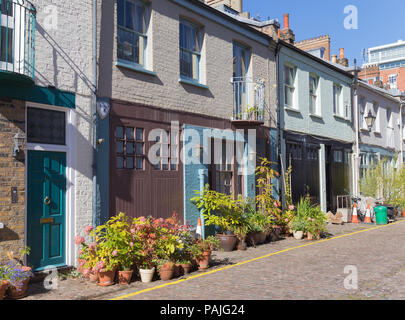 Upmarket mews houses in Kensington, west London, UK Stock Photo