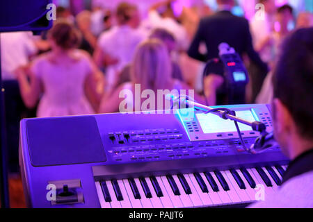 Dancing couples during party or wedding celebration Stock Photo