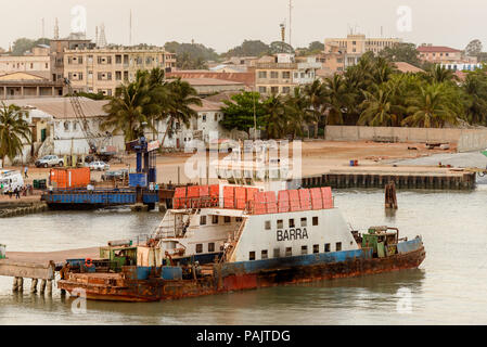 BANJUL, GAMBIA - MAR 14, 2013: Port of Banjul in Gambia, Mar 14, 2013. Major ethnic group in Gambia is the Mandinka - 42% Stock Photo