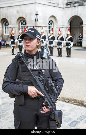 Armed London Metroplitain Police Officer on duty at Horse Guards Parade, Whitehall, London. London armed police. Armed Met Police. UK armed police.