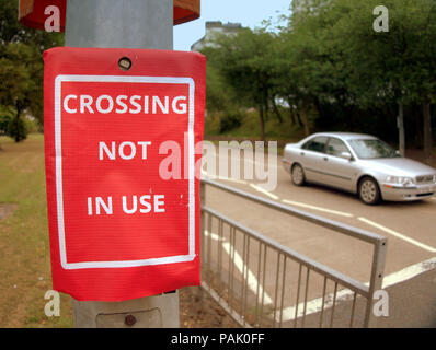 crossing not in use covers pedestrian crossing no lights Stock Photo