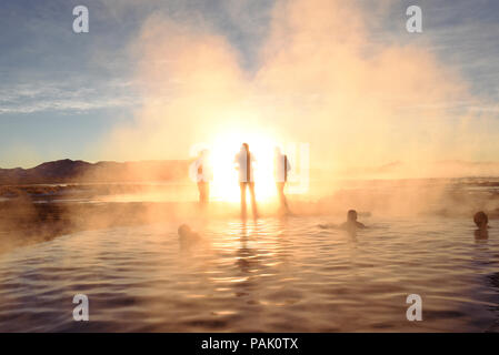 Sunrise and steaming hot springs. The small pool of Termas de Polques is 29C while outside it was -4C. Near Cerro Polques in Bolivia, South America Stock Photo