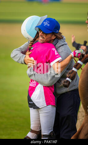 Polo legend Adolfo Cambiaso embraces his 16 year old daughter Mia of the UAE Ladies Polo Team immediately after their victory over Maiz Dulce in the B Stock Photo