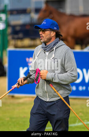 Polo legend Adolfo Cambiaso watches his 16 year old daughter Mia of the UAE Ladies Polo Team during their victory over Maiz Dulce in the British Ladie Stock Photo