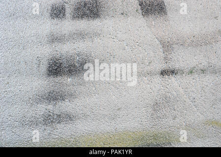 silver painted wall texture background detail of graffiti Stock Photo