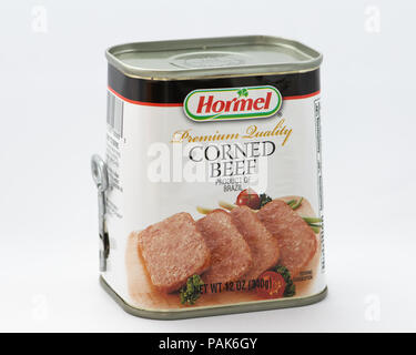 A can of Hormel premium quality Corned Beef, complete with key opener, a product of Brazil, isolated on white. Stock Photo