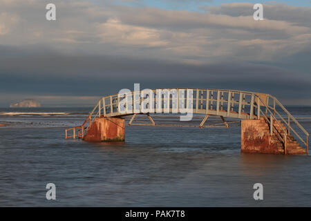 Bridge to Nowhere. also known as Stairs to Nowhere, Belhaven Bay, Dunbar, East Lothian across Beil Burn Stock Photo