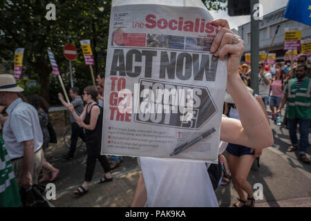 Cambridge, Cambridgeshire, UK. 21st July, 2018. The socialist workers paper on display in Cambridge.Protests calling for the release of Tommy Robinson have become a growing trend across the UK since his imprisonment in May. Public opinion is divided across Britain with regards to Tommy Robinson and the issue of freedom of speech in the UK. Credit: Edward Crawford/SOPA Images/ZUMA Wire/Alamy Live News Stock Photo