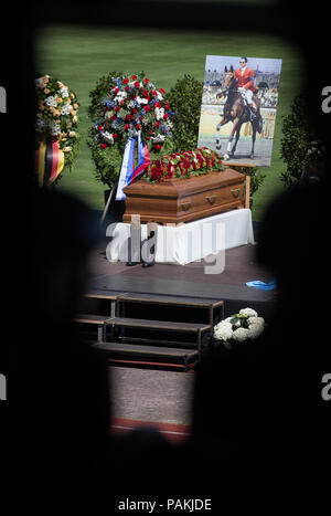 Warendorf, Germany. 24th July, 2018. The coffin of the late Hans Guenter Winkler is in the stadium of the sports school of the German Federal Defence. Winkler had died in Warendorf on 9 July 2018. He was the most successful German Olympic show jumper. Credit: Friso Gentsch/dpa/Alamy Live News Stock Photo