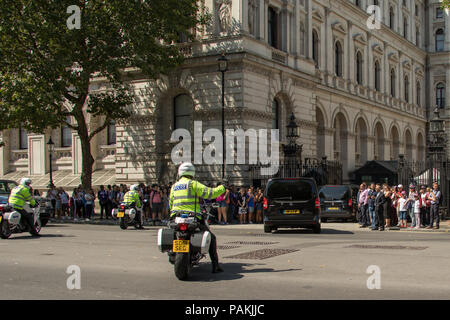 London,UK. 24 July 2018. The Emir of Qatar, Sheikh Tamim bin Hamad Al-Thani arrives with police escort at Downing Street for a meeting with British Prime Minister, Theresa May. David Rowe/ Alamy Live News Stock Photo