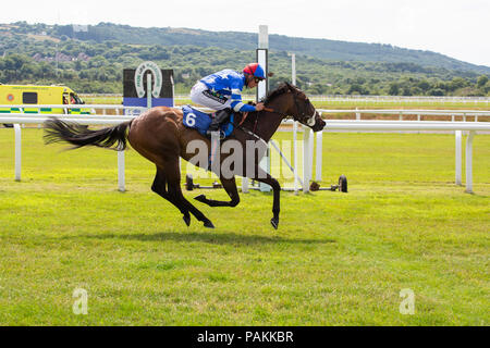 Ffos Las Racecourse, Trimsaran, Wales, UK. Tuesday 24 July 2018. Sweet Pursuit (jockey Jason Watson) wins the J Edwards Sellars Investments Handicap Credit: Gruffydd Thomas/Alamy Live News Stock Photo