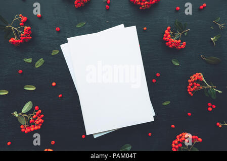 Hardcover book cover design mock up top view overhead shot with floral arrangement, retro toned flat lay minimalism Stock Photo