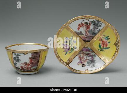 Cup and saucer. Artist: After a print by Claudine Bouzonnet Stella (French, Lyons 1636-1697 Paris). Culture: Italian, Florence. Dimensions: Overall (cup .1): 2 × 3 1/8 in. (5.1 × 7.9 cm); Diameter (saucer .2): 5 in. (12.7 cm). Factory director: Marchese Carlo Ginori. Maker: Manner of Jacques Stella (French, Lyons 1596-1657 Paris). Manufactory: Doccia Porcelain Manufactory (Italian, 1737-1896). Date: ca. 1750-55. Museum: Metropolitan Museum of Art, New York, USA. Stock Photo