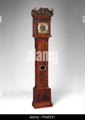 Longcase clock with calendar and alarm. Culture: Dutch, Amsterdam. Dimensions: Overall: 88 × 19 1/4 × 10 7/8 in. (223.5 × 48.9 × 27.6 cm); Width (dial plate): 10 1/2 in. (26.7 cm). Maker: Movement by Ahasuerus II Fromanteel (British, 1640-1703). Date: ca. 1690-94.  The longcase pendulum clock with anchor escapement was developed in England in 1670 and soon afterwards English clockmakers began making similar clocks in The Netherlands. The movement of this example was the work of such an English ex-patriot working in Amsterdam, Ahaseurus II Fromanteel (London has mistakenly been added to the dia Stock Photo