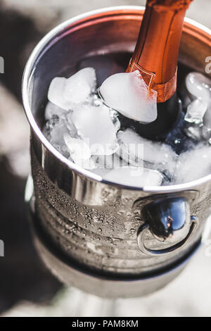 Bottle of champagne in an ice bucket Stock Photo