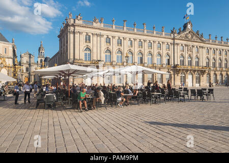 Nancy, France - 20 June 2018: Café Terrace in the Place Stanislas square at sunset. Stock Photo